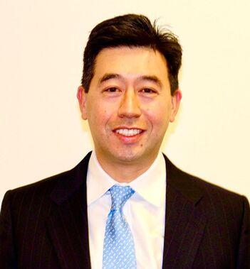 Headshot of David Tom, co-president at VCFA Group.